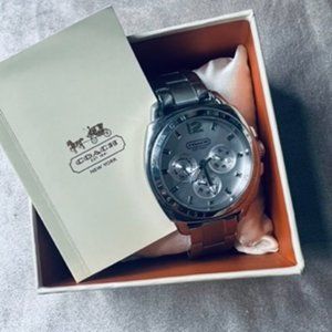 COACH women’s stainless steel women’s watch.